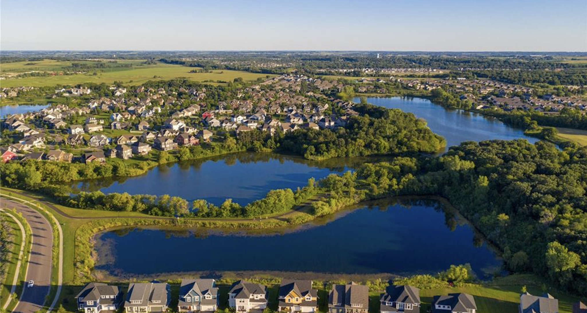 Twin Cities Minnesota suburb aerial view — lakes and homes